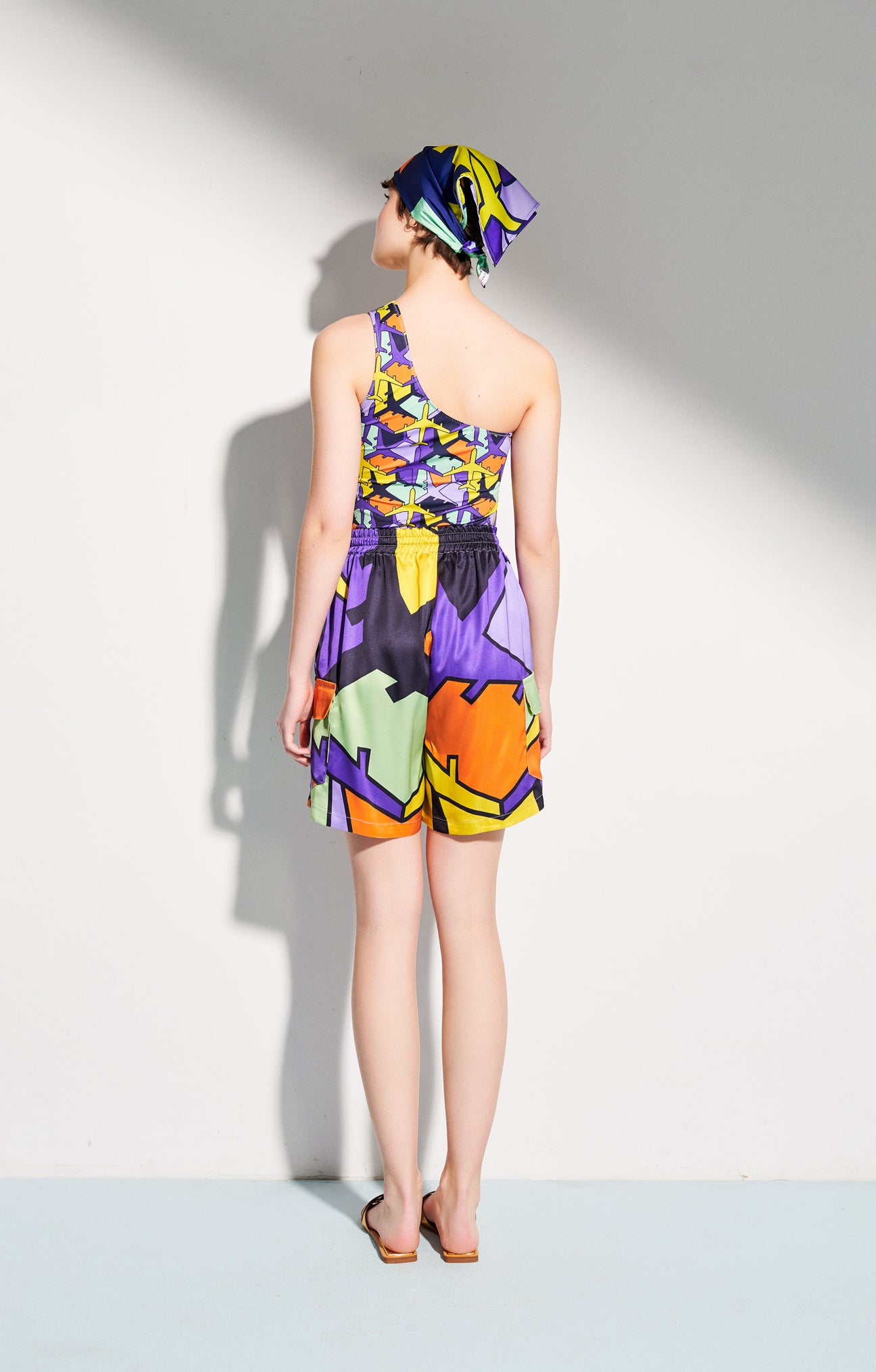 DELTA one-shoulder swimsuit 'airplanes'